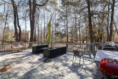 This 3 bed two bath fully remodeled home sits in an Amenity on Pocono Farms Country Club in Pennsylvania - for sale on GolfHomes.com, golf home, golf lot