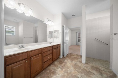 Welcome to this well-maintained 3 bedroom, 2 bath home nestled on Candler Hills Golf and Country Club in Florida - for sale on GolfHomes.com, golf home, golf lot