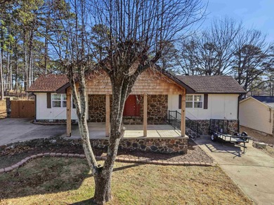 Welcome to 313 Snead Dr. in Fairfield Bay, perfectly positioned on Indian Hills Country Club in Arkansas - for sale on GolfHomes.com, golf home, golf lot