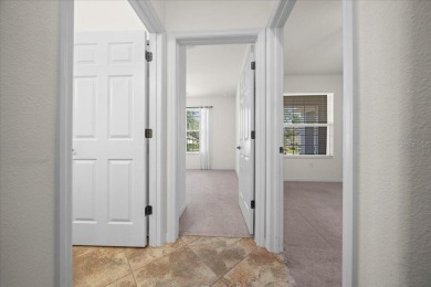 Welcome to this well-maintained 3 bedroom, 2 bath home nestled on Candler Hills Golf and Country Club in Florida - for sale on GolfHomes.com, golf home, golf lot