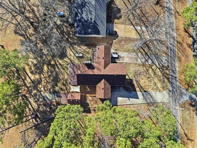 Welcome to 313 Snead Dr. in Fairfield Bay, perfectly positioned on Indian Hills Country Club in Arkansas - for sale on GolfHomes.com, golf home, golf lot