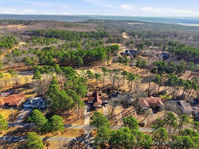 Welcome to 313 Snead Dr. in Fairfield Bay, perfectly positioned on Indian Hills Country Club in Arkansas - for sale on GolfHomes.com, golf home, golf lot