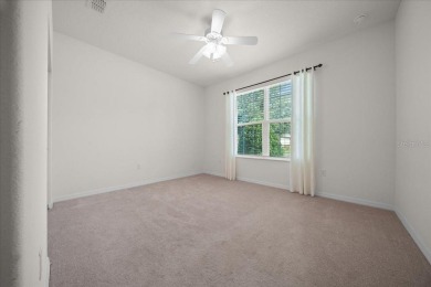 Welcome to this well-maintained 3 bedroom, 2 bath home nestled on Candler Hills Golf and Country Club in Florida - for sale on GolfHomes.com, golf home, golf lot
