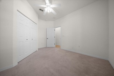 Welcome to this well-maintained 3 bedroom, 2 bath home nestled on Candler Hills Golf and Country Club in Florida - for sale on GolfHomes.com, golf home, golf lot