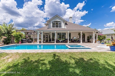 This stunning POOL HOME overlooking the second green of the on Eagle Harbor Golf Club in Florida - for sale on GolfHomes.com, golf home, golf lot