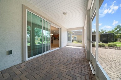 Welcome to this well-maintained 3 bedroom, 2 bath home nestled on Candler Hills Golf and Country Club in Florida - for sale on GolfHomes.com, golf home, golf lot