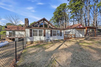 Welcome to 313 Snead Dr. in Fairfield Bay, perfectly positioned on Indian Hills Country Club in Arkansas - for sale on GolfHomes.com, golf home, golf lot