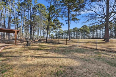 Welcome to 313 Snead Dr. in Fairfield Bay, perfectly positioned on Indian Hills Country Club in Arkansas - for sale on GolfHomes.com, golf home, golf lot