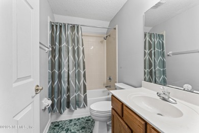 Welcome to your beautifully maintained pool home in Julington on Julington Creek Golf Club in Florida - for sale on GolfHomes.com, golf home, golf lot