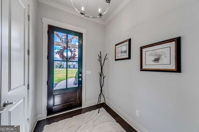 Located in the prestigious Chimney Oaks golf community, this on Chimney Oaks Golf Club in Georgia - for sale on GolfHomes.com, golf home, golf lot