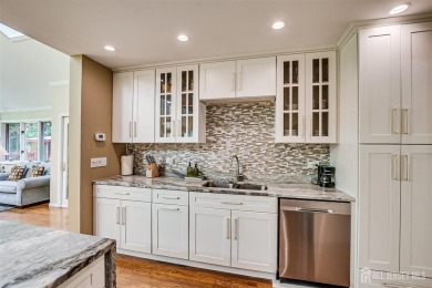 This magnificent well maintained expanded home (completed in on Metuchen Golf and Country Club in New Jersey - for sale on GolfHomes.com, golf home, golf lot
