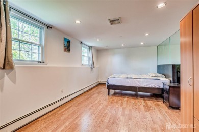 This magnificent well maintained expanded home (completed in on Metuchen Golf and Country Club in New Jersey - for sale on GolfHomes.com, golf home, golf lot