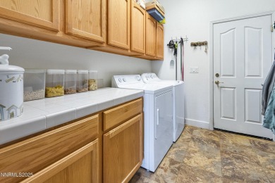 Located just off the tee box on the signature 4th hole at the on Dayton Valley Golf Club At Legado in Nevada - for sale on GolfHomes.com, golf home, golf lot
