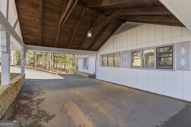 This adorable 4-bedroom, 4.5-bathroom mountain cabin is located on Sky Valley Resort and Country Club in Georgia - for sale on GolfHomes.com, golf home, golf lot