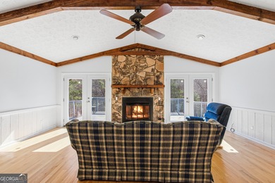 This adorable 4-bedroom, 4.5-bathroom mountain cabin is located on Sky Valley Resort and Country Club in Georgia - for sale on GolfHomes.com, golf home, golf lot