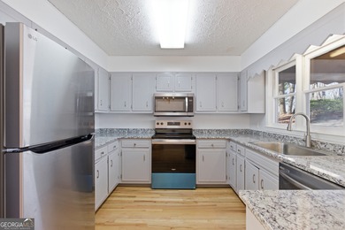 This adorable 4-bedroom, 4.5-bathroom mountain cabin is located on Sky Valley Resort and Country Club in Georgia - for sale on GolfHomes.com, golf home, golf lot