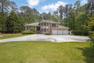 Get ready to fall in love with this stunning all-brick 6-bedroom on Fairfield Plantation Golf and Country Club in Georgia - for sale on GolfHomes.com, golf home, golf lot