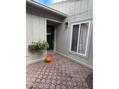 Discover this stunning 3-bedroom, 3-bath townhouse with a 2-car on Woodlake Country Club in North Carolina - for sale on GolfHomes.com, golf home, golf lot