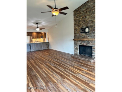 Discover this stunning 3-bedroom, 3-bath townhouse with a 2-car on Woodlake Country Club in North Carolina - for sale on GolfHomes.com, golf home, golf lot