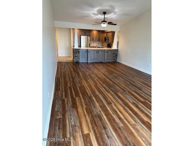 Discover this stunning 3-bedroom, 3-bath townhouse with a 2-car on Woodlake Country Club in North Carolina - for sale on GolfHomes.com, golf home, golf lot