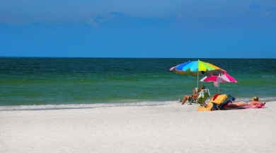 Stunning sunsets and carefree living in this maintenance-free on The Meadows Golf and Country Club in Florida - for sale on GolfHomes.com, golf home, golf lot