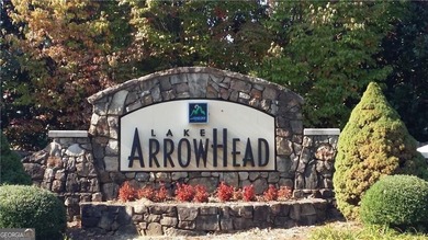 It's a hidden gem defined by its natural beauty and resort-style on The Highlands Course at Lake Arrowhead in Georgia - for sale on GolfHomes.com, golf home, golf lot