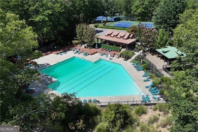 It's a hidden gem defined by its natural beauty and resort-style on The Highlands Course at Lake Arrowhead in Georgia - for sale on GolfHomes.com, golf home, golf lot