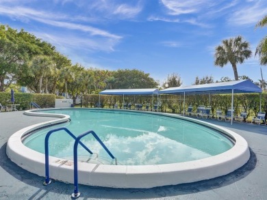 Welcome To Your Hidden Slice Of Paradise! Stunning 2/2 Offers on Oriole Golf and Tennis Club in Florida - for sale on GolfHomes.com, golf home, golf lot
