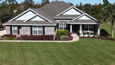 This immaculate 4/3 home sits on over 1/2 acre on the 6th hole on Windswept Dunes Golf Club in Florida - for sale on GolfHomes.com, golf home, golf lot