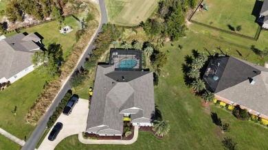 This immaculate 4/3 home sits on over 1/2 acre on the 6th hole on Windswept Dunes Golf Club in Florida - for sale on GolfHomes.com, golf home, golf lot