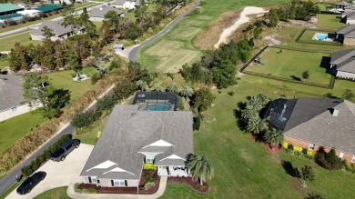 This immaculate 4/3 home sits on over 1/2 acre on the 6th hole on Windswept Dunes Golf Club in Florida - for sale on GolfHomes.com, golf home, golf lot