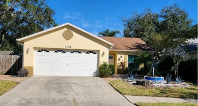 This beautiful home is located in the Glen Oaks neighborhood! on Countryway Golf Course in Florida - for sale on GolfHomes.com, golf home, golf lot