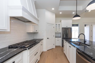 Stunning new patio/garden home built by Stately Homes in The on Tascosa Country Club in Texas - for sale on GolfHomes.com, golf home, golf lot