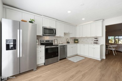 You know that feeling when you walk into a home and immediately on Tomoka Oaks Golf and Country Club in Florida - for sale on GolfHomes.com, golf home, golf lot