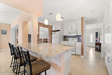 Nestled within 55+ Palm Beach Leisureville, this updated on Leisureville Community Golf Course in Florida - for sale on GolfHomes.com, golf home, golf lot