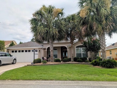 This Custom expanded Gardenia Model has pictuesqes views through on Glenview Championship Golf and Country Club in Florida - for sale on GolfHomes.com, golf home, golf lot