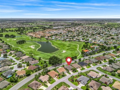 This Custom expanded Gardenia Model has pictuesqes views through on Glenview Championship Golf and Country Club in Florida - for sale on GolfHomes.com, golf home, golf lot