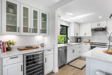 Experience effortless living in this fully renovated 2-bedroom on Country Club of Florida in Florida - for sale on GolfHomes.com, golf home, golf lot