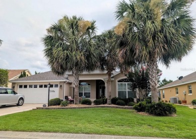 This Custom expanded Gardenia Model has pictuesqes views through on Glenview Championship Golf and Country Club in Florida - for sale on GolfHomes.com, golf home, golf lot