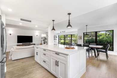 Experience effortless living in this fully renovated 2-bedroom on Country Club of Florida in Florida - for sale on GolfHomes.com, golf home, golf lot