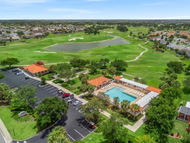 This Custom expanded Gardenia Model has pictuesqes views through on Glenview Championship Golf and Country Club in Florida - for sale on GolfHomes.com, golf home, golf lot
