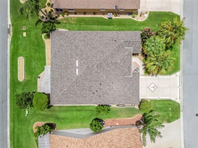 This Custom expanded Gardenia Model has pictuesqes views through on Glenview Championship Golf and Country Club in Florida - for sale on GolfHomes.com, golf home, golf lot