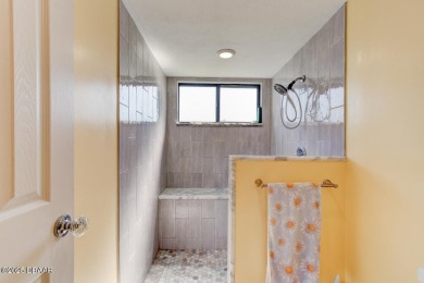 Enjoy easy living in this comfortable, upgraded 2 bed/2 bath on The Club At Pelican Bay - North Course in Florida - for sale on GolfHomes.com, golf home, golf lot