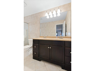 Nestled within 55+ Palm Beach Leisureville, this updated on Leisureville Community Golf Course in Florida - for sale on GolfHomes.com, golf home, golf lot