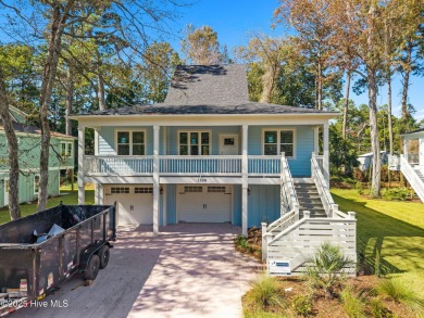 Experience the perfect blend of modern luxury and coastal charm on Brick Landing Plantation Yacht and Golf Club in North Carolina - for sale on GolfHomes.com, golf home, golf lot