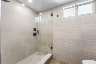 Experience effortless living in this fully renovated 2-bedroom on Country Club of Florida in Florida - for sale on GolfHomes.com, golf home, golf lot