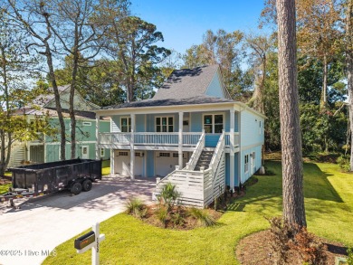 Experience the perfect blend of modern luxury and coastal charm on Brick Landing Plantation Yacht and Golf Club in North Carolina - for sale on GolfHomes.com, golf home, golf lot