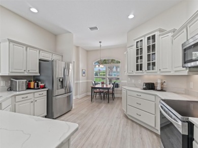 This Custom expanded Gardenia Model has pictuesqes views through on Glenview Championship Golf and Country Club in Florida - for sale on GolfHomes.com, golf home, golf lot