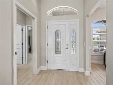 This Custom expanded Gardenia Model has pictuesqes views through on Glenview Championship Golf and Country Club in Florida - for sale on GolfHomes.com, golf home, golf lot