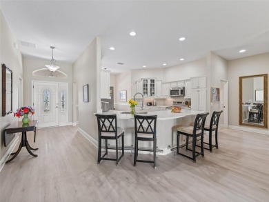 This Custom expanded Gardenia Model has pictuesqes views through on Glenview Championship Golf and Country Club in Florida - for sale on GolfHomes.com, golf home, golf lot